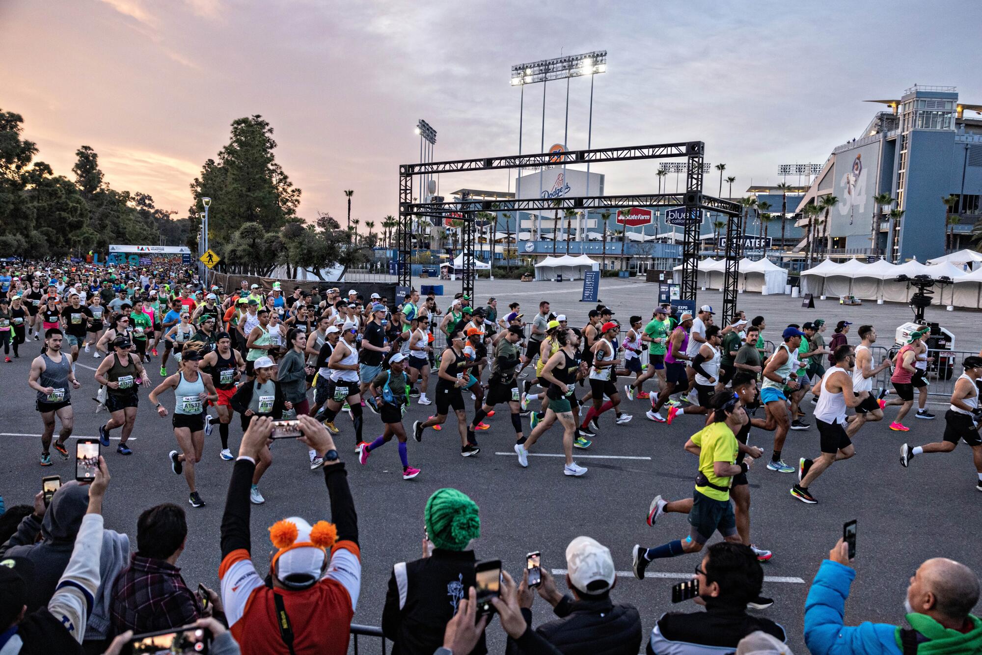 Runners begin the 39th Los Angeles Marathon at Dodger Stadium.