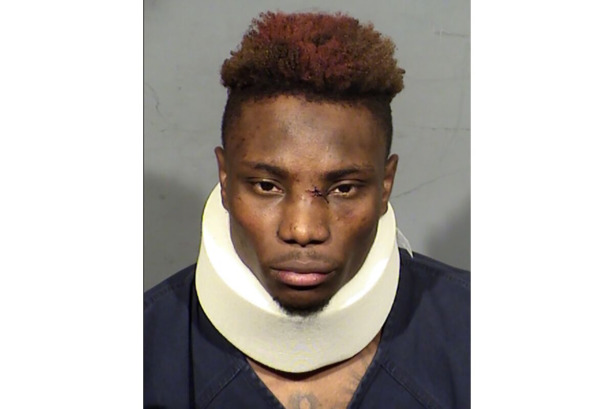 FILE - This booking photo provided by Las Vegas Metropolitan Police Department shows former Las Vegas Raiders wide receiver Henry Ruggs III following his arrest Tuesday, Nov. 2, 2021. Attorneys for former Raiders player Henry Ruggs III are fighting to keep his medical records out of the hands of prosecutors charging him with driving under the influence in a fiery crash that killed a woman and cost Ruggs his NFL job. (Clark County Detention Center via AP, File)