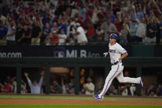 Texas Rangers' Corey Seager runs the bases after hitting a solo home run in the first inning of Game 3 of a baseball AL Division Series against the Baltimore Orioles on Tuesday, Oct. 10, 2023, in Arlington, Texas. (AP Photo/Julio Cortez)