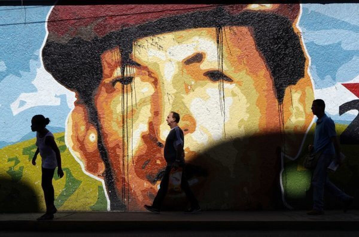 A mural in Caracas, Venezuela, depicts President Hugo Chavez, who won reelection to a third six-year term.
