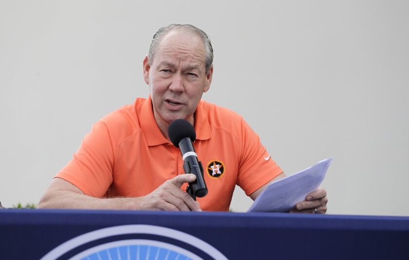 Houston Astros owner Jim Crane speaks during a news conference.