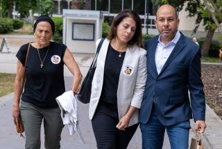 Van Nuys, CA - June 10: Karim Iskander, right, and wife Nancy Iskander, center, arrive for Rebecca Grossman sentencing on Monday, June 10, 2024 in Van Nuys, CA. (Brian van der Brug / Los Angeles Times)