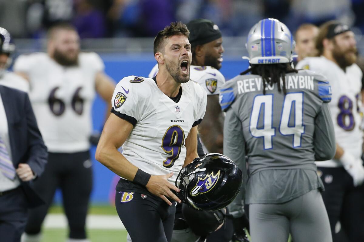 Baltimore Ravens kicker Justin Tucker celebrates after kicking a 66-yard field goal.
