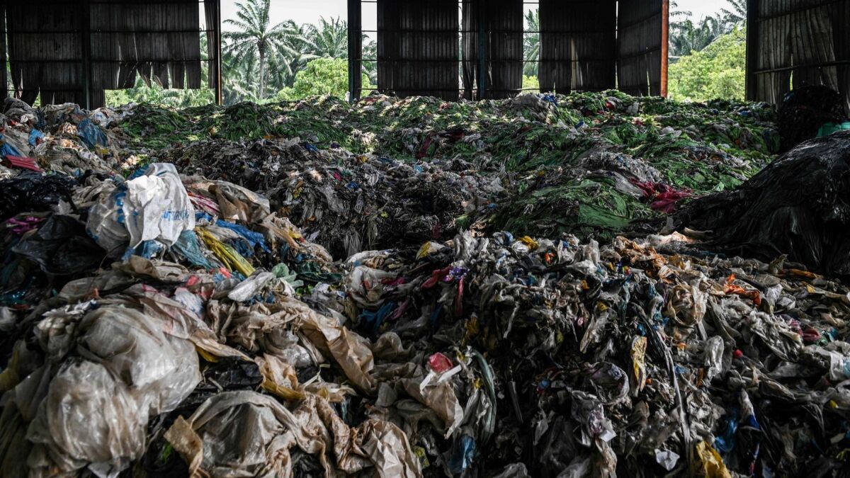 Plastic waste is seen at an abandoned factory in Jenjarom, outside the Malaysian capital Kuala Lumpur.