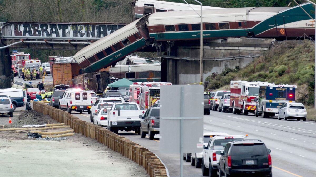 An Amtrak high-speed train derailed from an overpass on Dec. 18, 2017, near Tacoma, Wash., killing multiple people and sending cars flying off a bridge and onto a busy interstate.