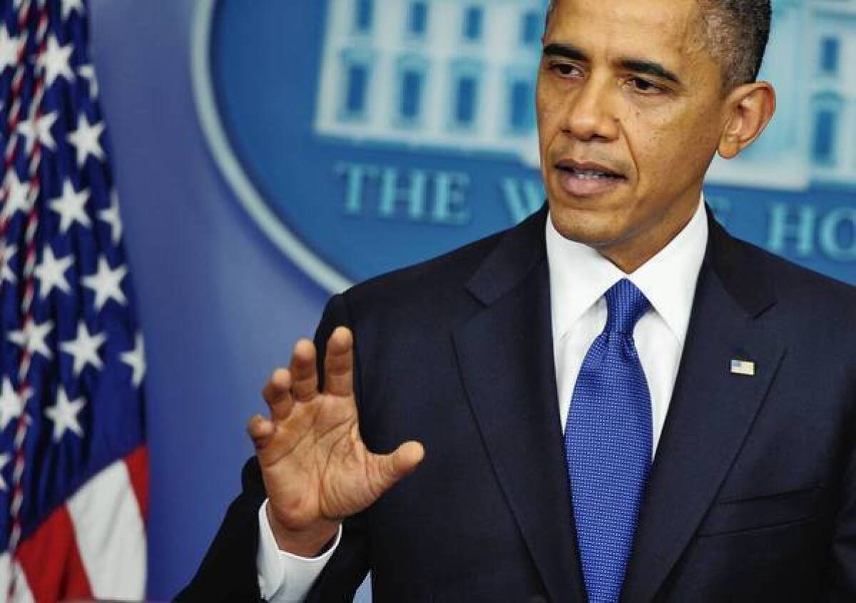 President Obama, speaking at the White House as "fiscal cliff" talks remain deadlocked, urges Congress to at least prevent tax hikes on incomes under $250,000 and delay major spending cuts due in January.