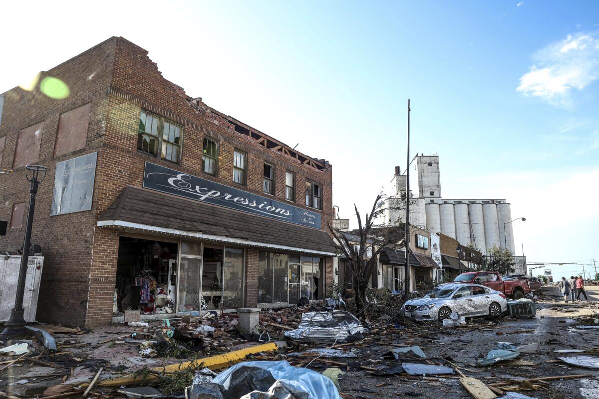 Buildings and vehicles damaged by a tornado