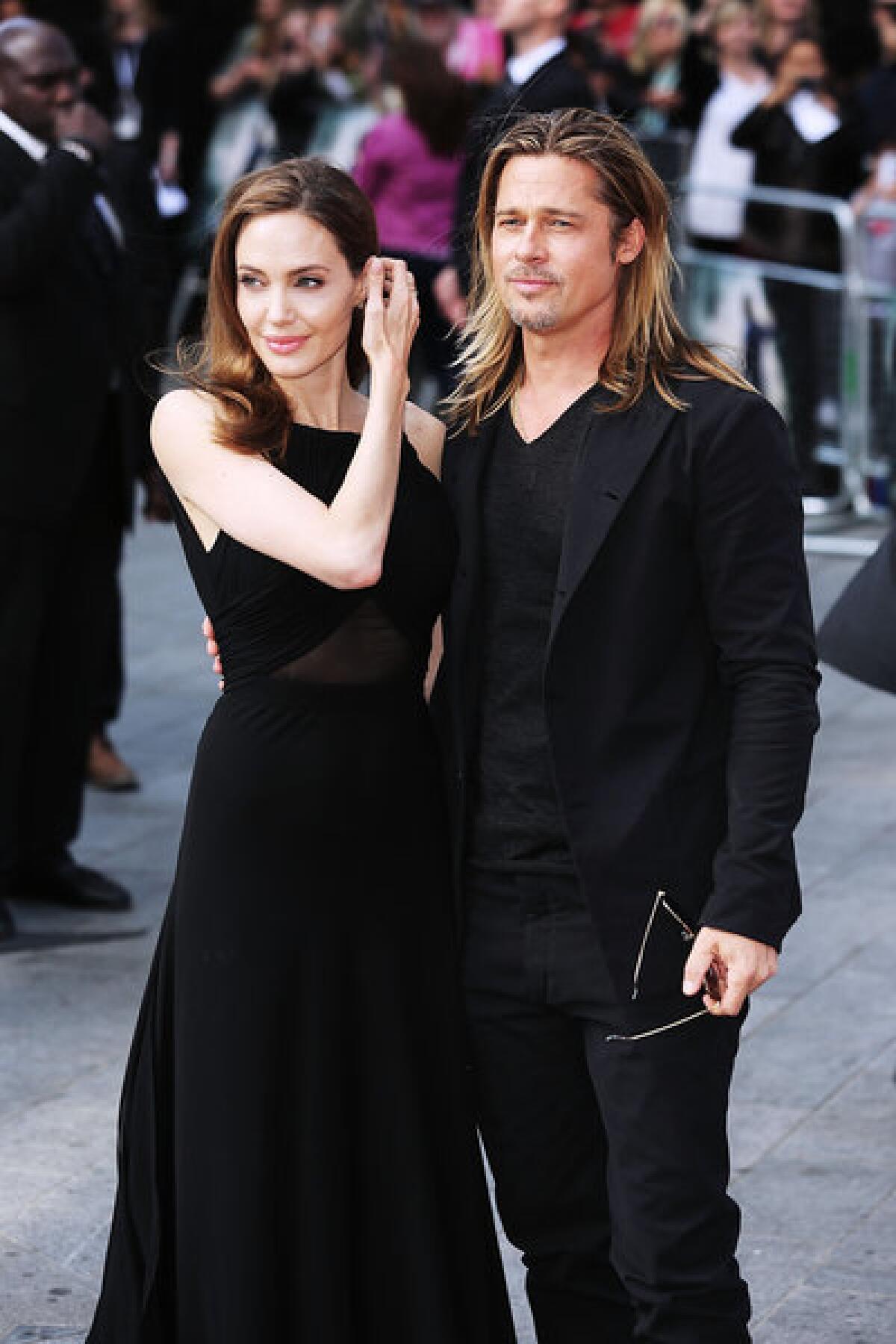 In her first red-carpet appearance since revealing her double mastectomy, Angelina Jolie accompanies "World War Z" star Brad Pitt at the movie's London premiere Sunday.