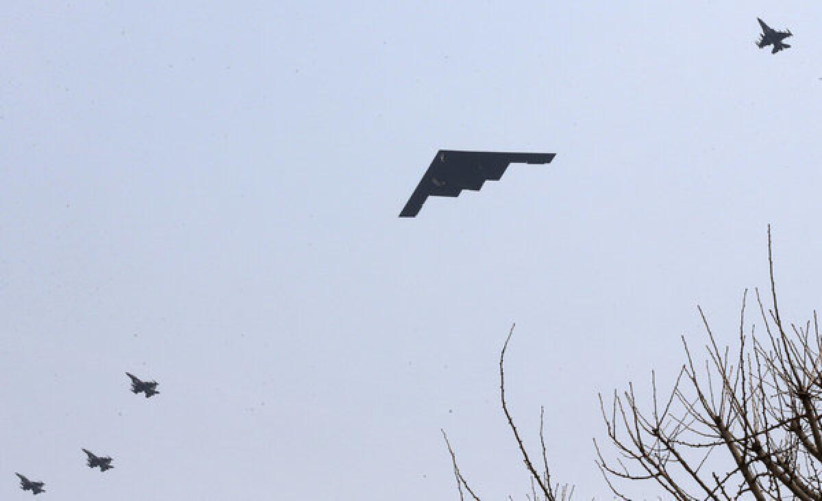 A U.S. Air Force B-2 stealth bomber flies near the Osan Air Base south of Seoul.
