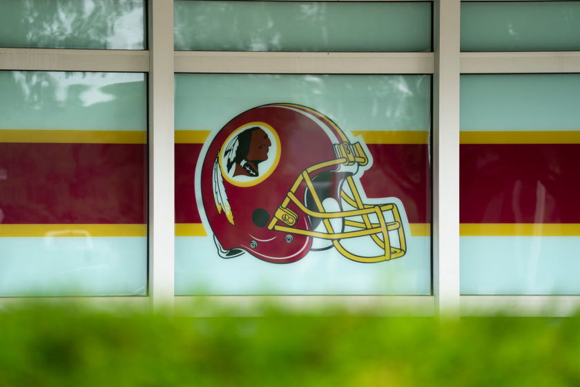 LANDOVER, MD - JULY 07: A Washington Redskins helmet logo adorns a window on the outside of FedEx Field on July 7, 2020 in Landover, Maryland. After receiving recent pressure from sponsors and retailers, the NFL franchise is considering a name change to replace Redskins. The term "redskin" is a dictionary-defined racial slur for Native Americans. (Photo by Drew Angerer/Getty Images)