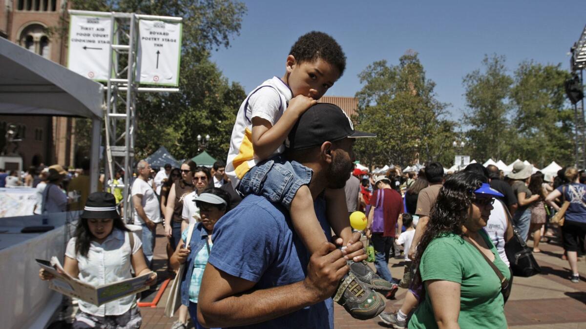 Collin Hinds with his son Preston at the 2013 L.A. Times Festival of Books.