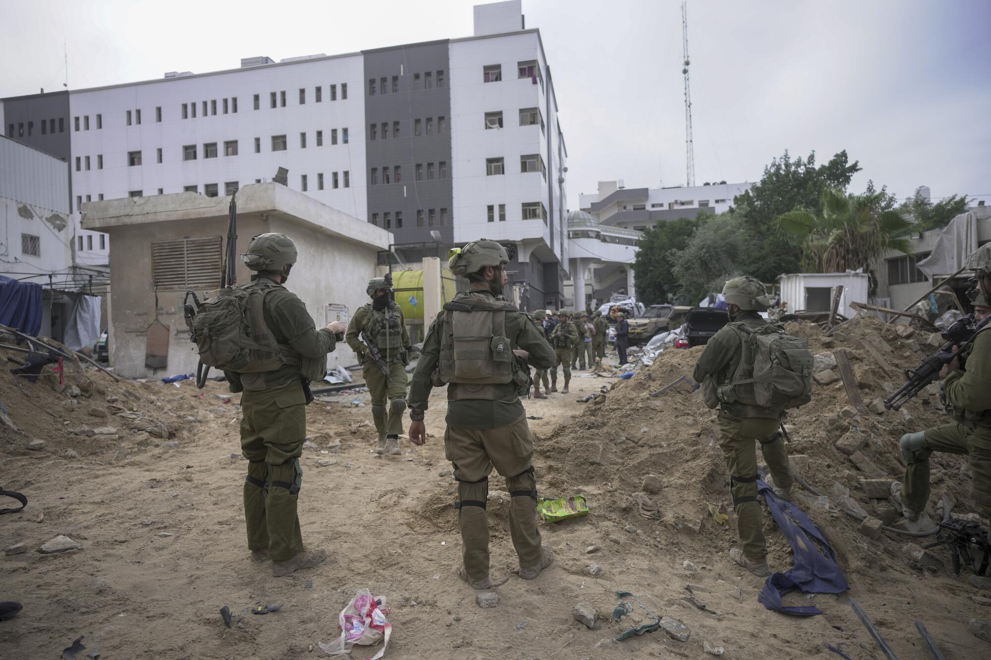 Israeli soldiers outside Shifa Hospital in Gaza City