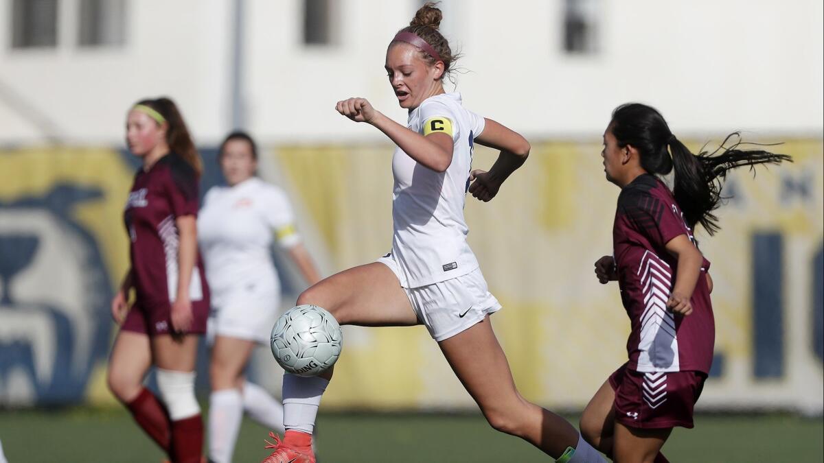 Pacifica Christian Orange County High's Sadie Hill, center, shown competing against Alhambra Mark Keppel on Feb. 13, 2018, helped the Tritons to a 7-0 win over Tarbut V’Torah on Monday.