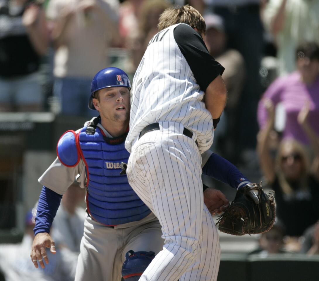 White Sox baserunner A.J. Pierzysnki collides with Cubs catcher Michael Barrett at home plate during the second inning at U.S. Cellular Field on May 20, 2006. The result?