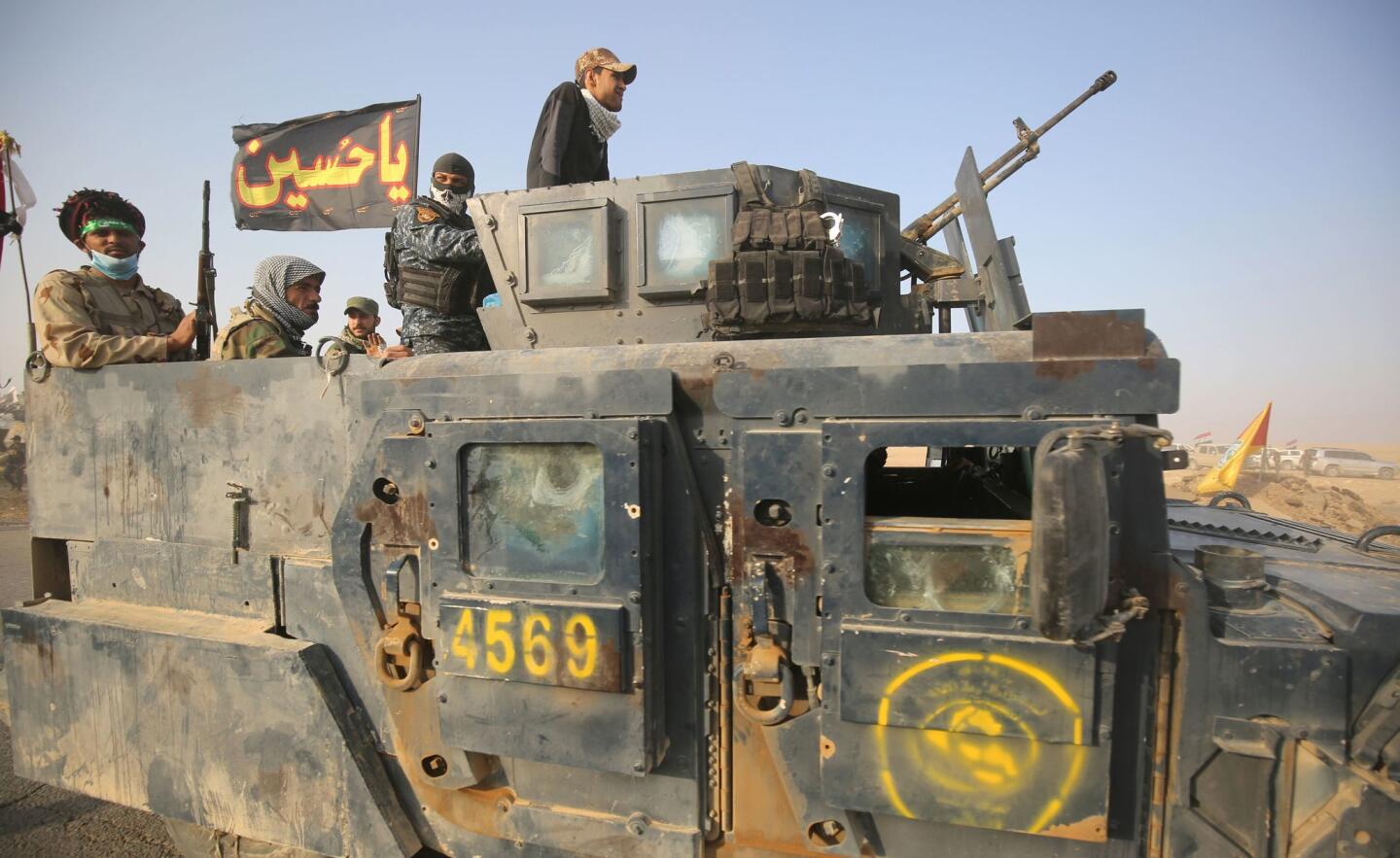 Iraqi forces and Shiite militia