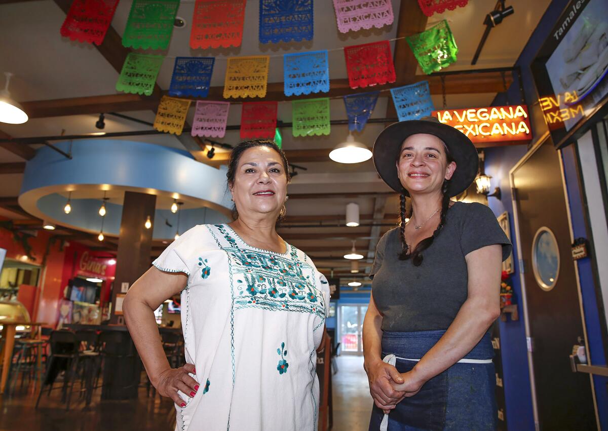 Loreta Ruiz of La Vegana Mexicana and Delilah Snell, owner of Alta Baja Market and cafe.