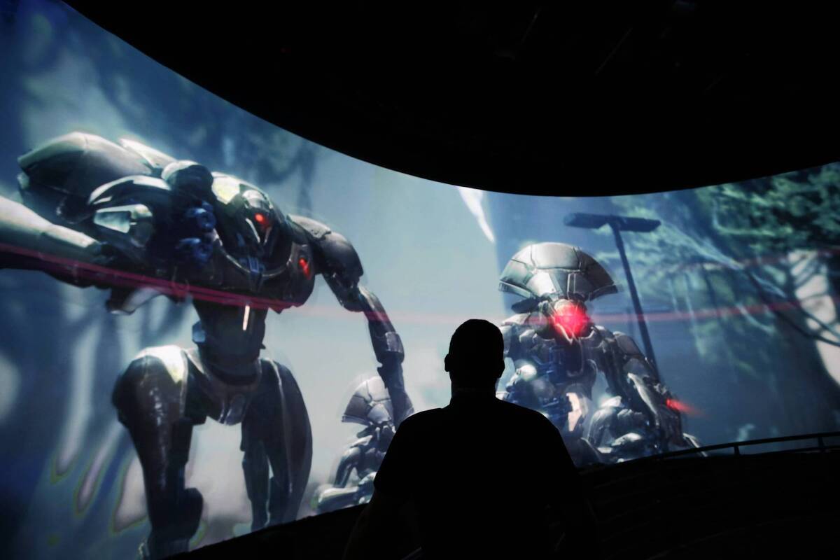 Activision Blizzard gives a presentation about its video game "Destiny" at the Electronic Entertainment Expo in Los Angeles last month.