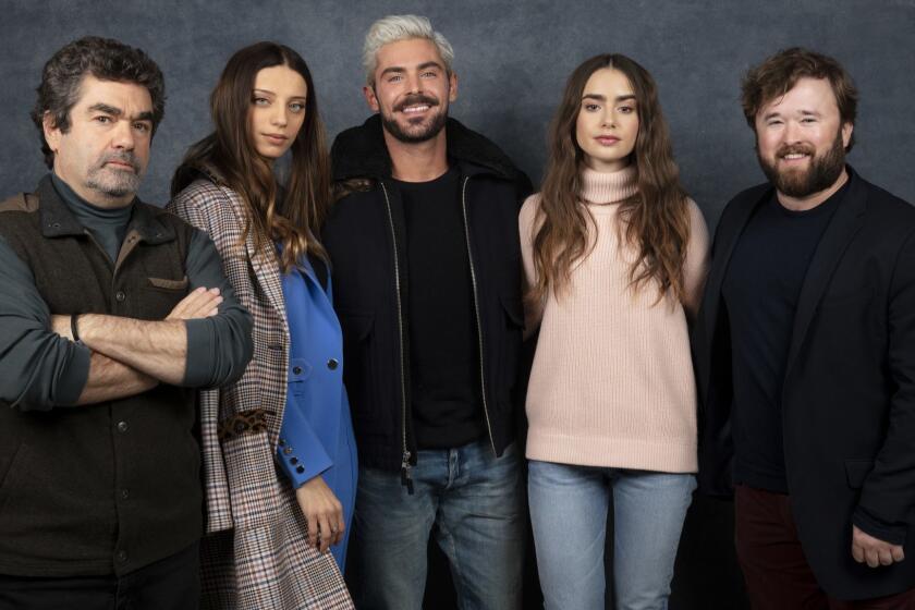 PARK CITY, UTAH -- JANUARY 26, 2019 -- Director Joe Berlinger, actors Angela Sarafyan and Zac Efron, Lily Collins, and Haley Joel Osment, from the film, "Extremely Wicked, Shockingly Evil and Vile," photographed at the L.A. Times Photo and Video Studio at the 2019 Sundance Film Festival, in Park City, Utah, United States on Saturday, Jan. 26, 2019 (Jay L. Clendenin / Los Angeles Times)