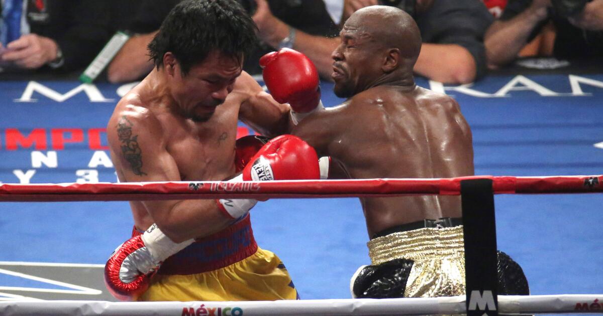 Manny Pacquiao laments injury after losing to Floyd Mayweather Jr.