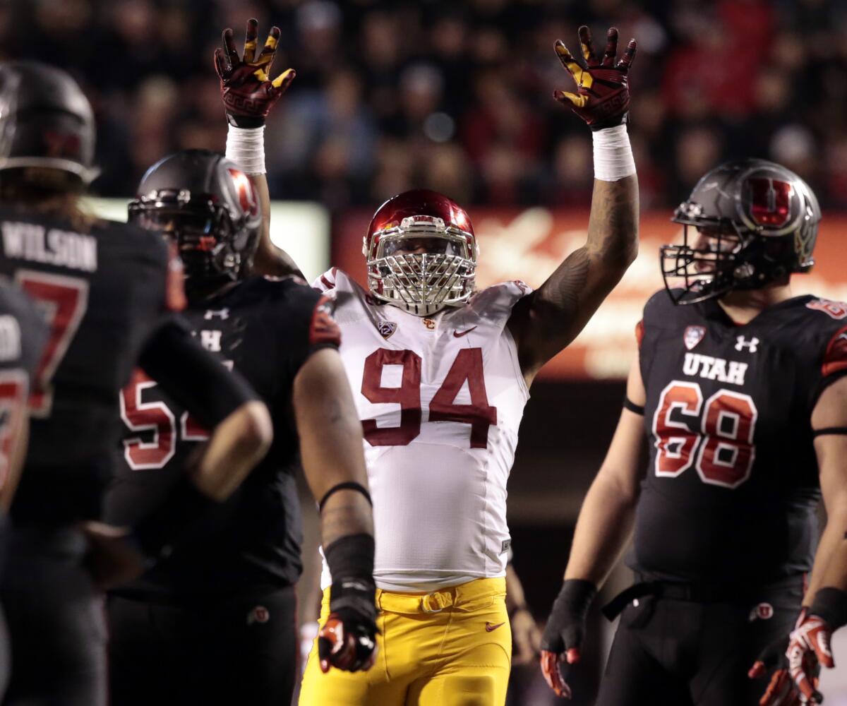 USC defensive tackle Leonard Williams celebrates a stop by the Trojans against Utah in October.