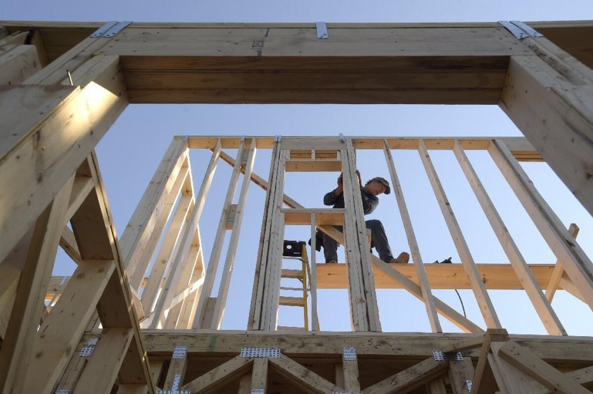 Low mortgage rates bode well for borrowers as the spring home-buying season arrives. Above, construction in Orlando, Fla.