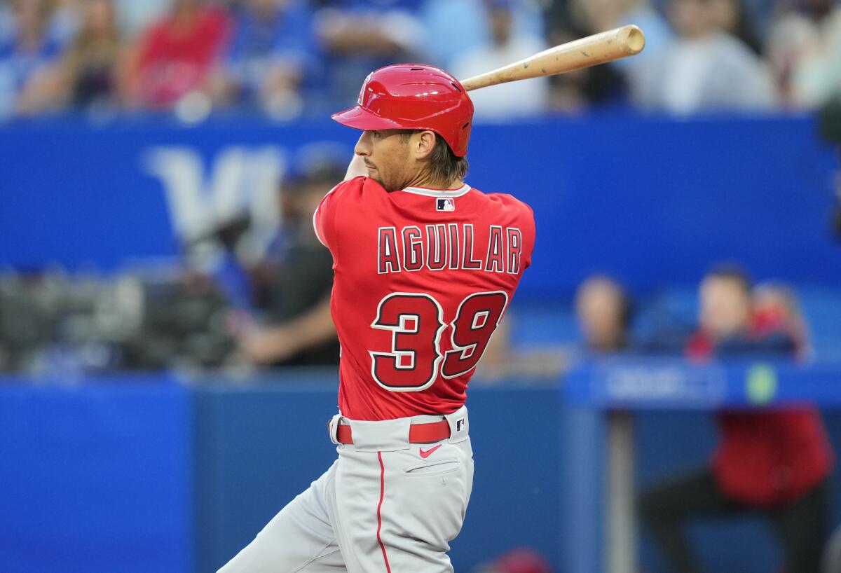 Ryan Aguilar swings at a pitch during a game between the Angels and Toronto Blue Jays.