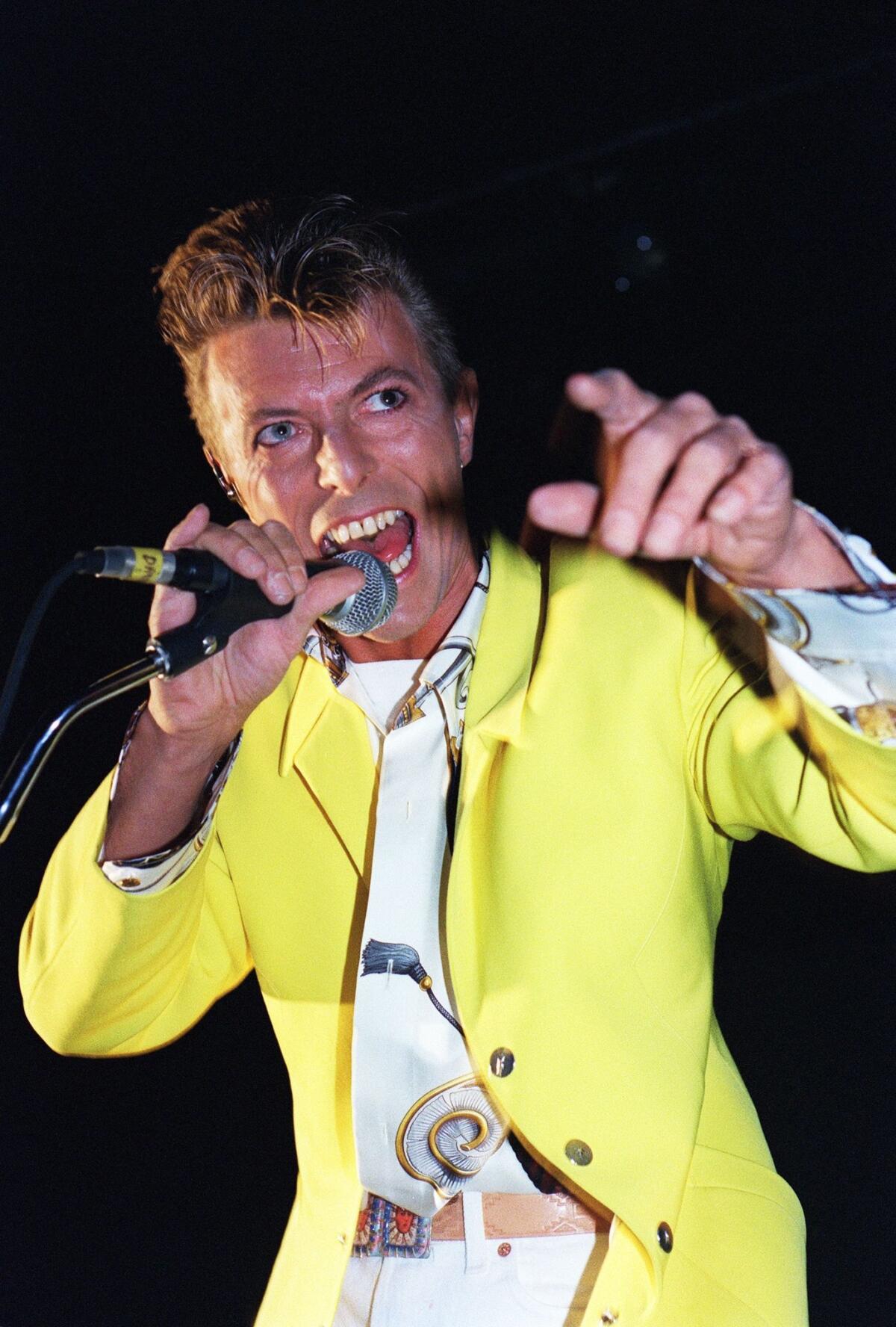 David Bowie performs at the Olympia concert hall in Paris on Oct. 29, 1991.