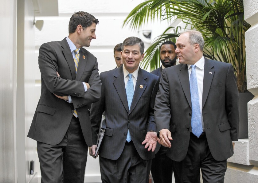 Rep. Paul D. Ryan (R-Wis.), left, Rep. Jeb Hensarling (R-Texas) and House Majority Whip Steve Scalise (R-La.) arrive for a Republican strategy session on Capitol Hill in Washington. Ryan is poised to take charge of the House Ways and Means Committee as leaders are chosen for the new 114th Congress that convenes in January.