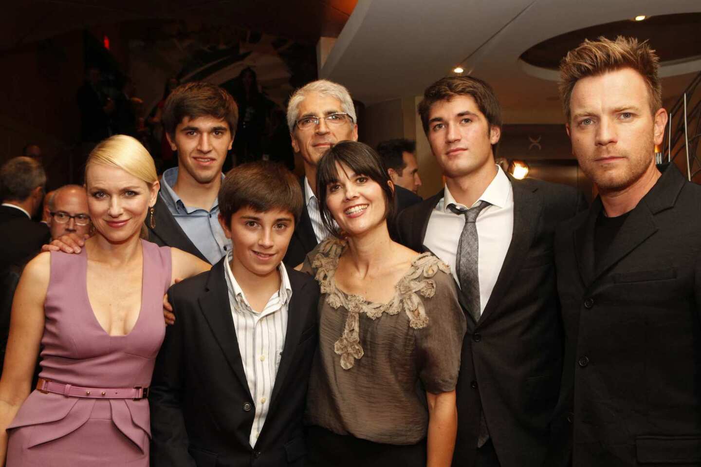 Naomi Watts, far left, and Ewan McGregor, far right, with members of the Belon family who survived the 2004 Indian Ocean tsunami that claimed nearly 300,000 lives. The Belons' story is featured in the new movie "The Impossible."