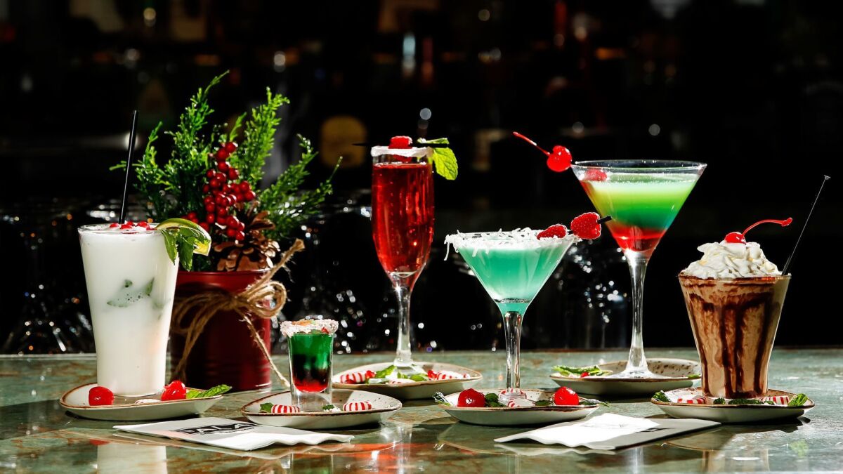 Getting into the spirit of the season, San Diego-area casinos are crafting holiday cocktails, including these from Pala Casino Spa & Resort: (left to right) White Christmas Mojito, Santa's Shot, Cranberry Mimosa, Jack Frost, Candy Cane and Nogtini.
