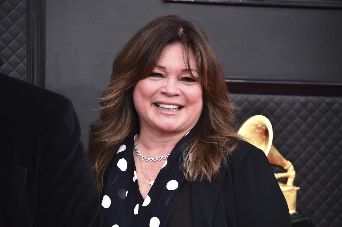 Valerie Bertinelli smiles on a Grammy Awards red carpet