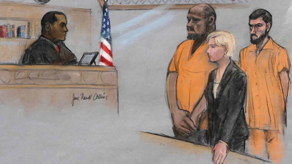 In this June 19, 2015, file, courtroom sketch, David Wright, second from left, stands before Magistrate Judge Donald Cabell, with attorney Jessica Hedges, second from right, and Nicholas Rovinski, right, during a hearing in federal court in Boston.