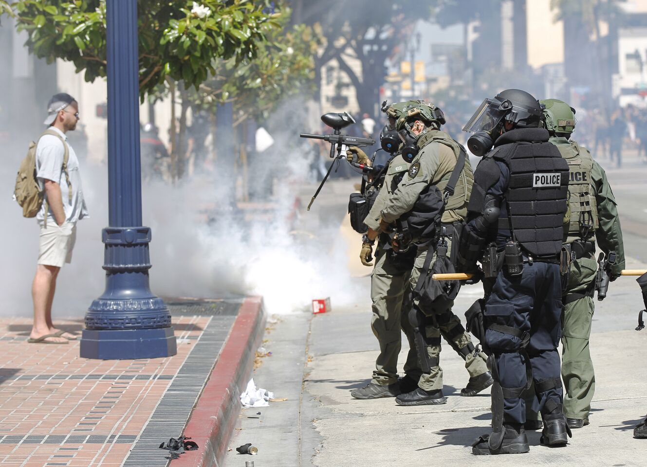 San Diego police fired rubber bullets, tear gas and flash bangs at protesters near the San Diego Hall of Justice in San Diego on May 31, 2020. The group was protesting the death of George Floyd.