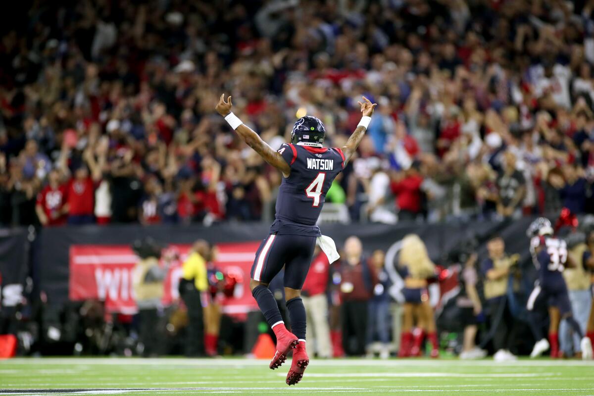 Houston Texans quarterback Deshaun Watson celebrates a score against the Buffalo Bills on Jan. 4 at NRG Stadium.