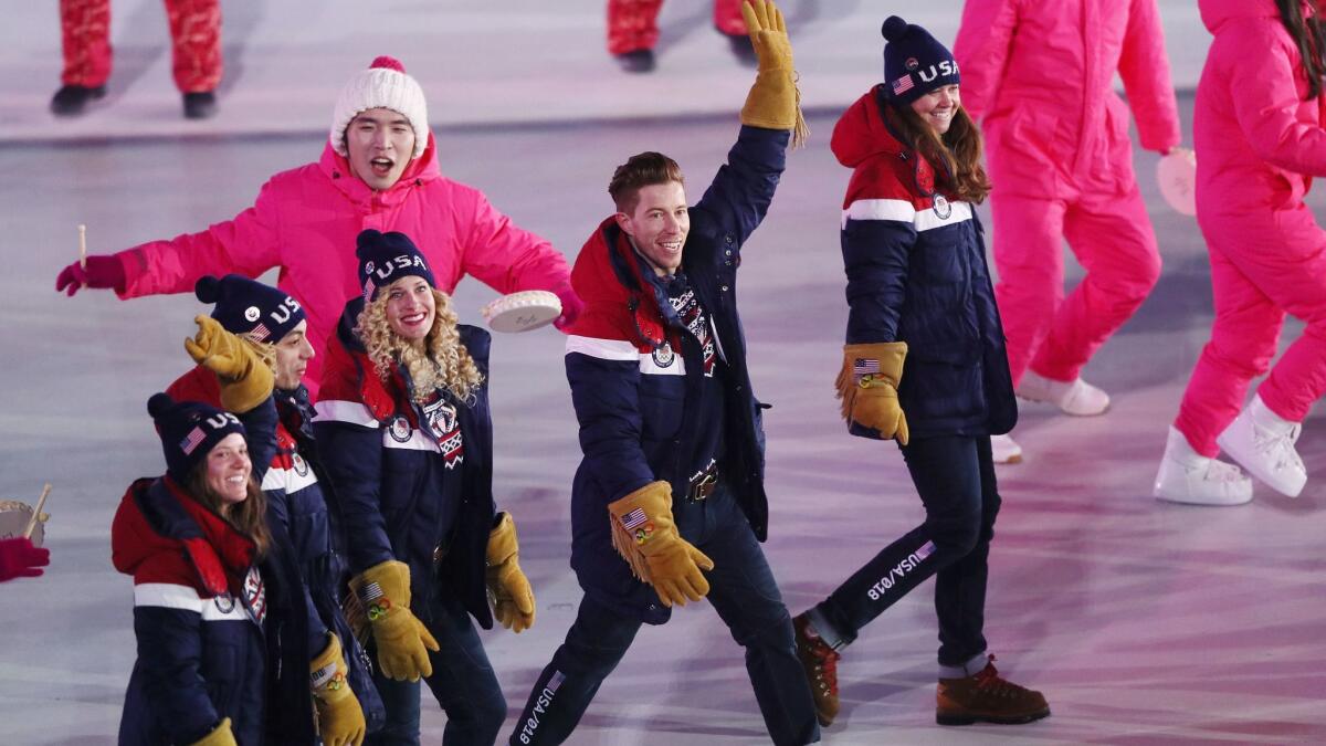 Shaun White waves during the opening ceremony of the Pyeongchang Winter Olympics.