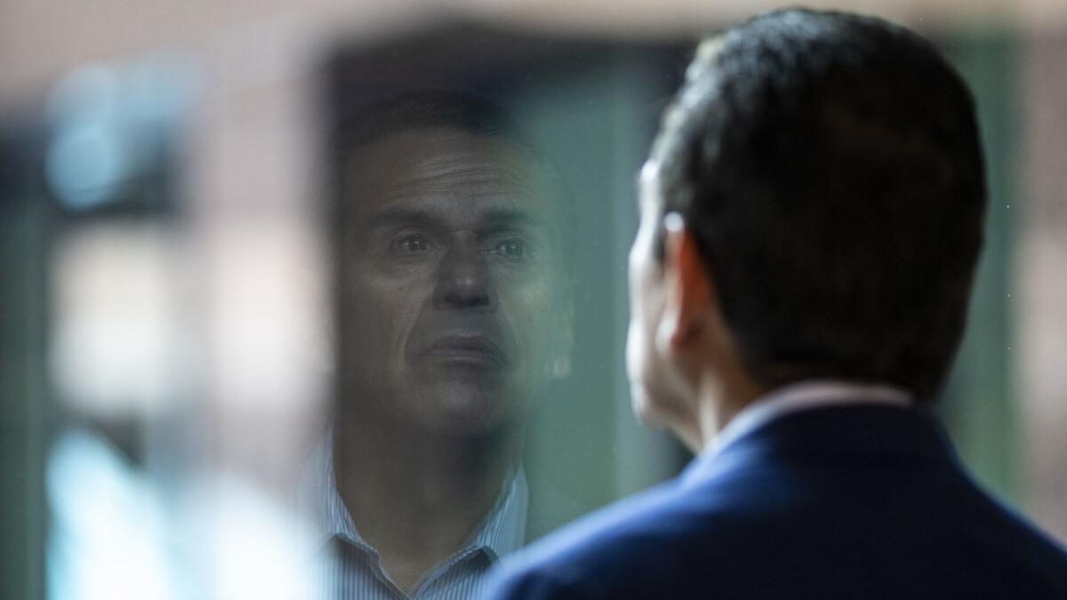 Former L.A. Mayor Antonio Villaraigosa, pictured before a radio interview Thursday, trails GOP businessman John Cox in their campaigns for California governor, a UC Berkeley poll shows.