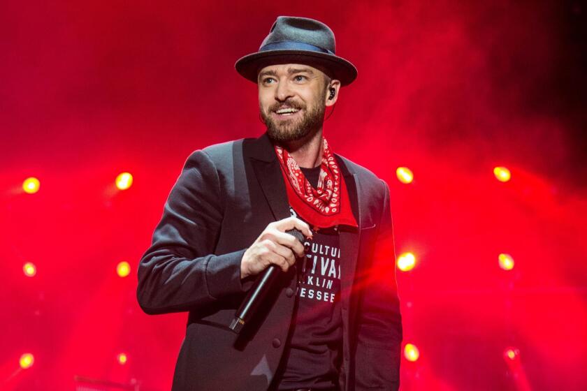 FILE - In this Sept. 23, 2017 file photo, Justin Timberlake performs at the Pilgrimage Music and Cultural Festival in Franklin, Tenn. Timberlake previewed his new album âMan of the Woodsâ Tuesday, Jan. 16, 2018, at a venue that was decorated with bushes and trees, and served ants coated in black garlic and rose oil and grasshoppers, showcasing the albumâs theme. Timberlake, who will headline next monthâs Super Bowl halftime show, worked again with his mega-producer Timbaland on the album. First single and album opener, âFilthy,â debuted at No. 9 on the Billboard Hot 100 chart this week. (Photo by Amy Harris/Invision/AP, File)
