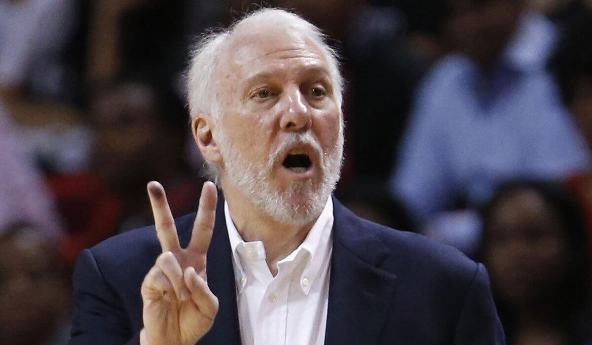 San Antonio Coach Gregg Popovich calls out a play during the Spurs' game against Miami on Oct. 12.