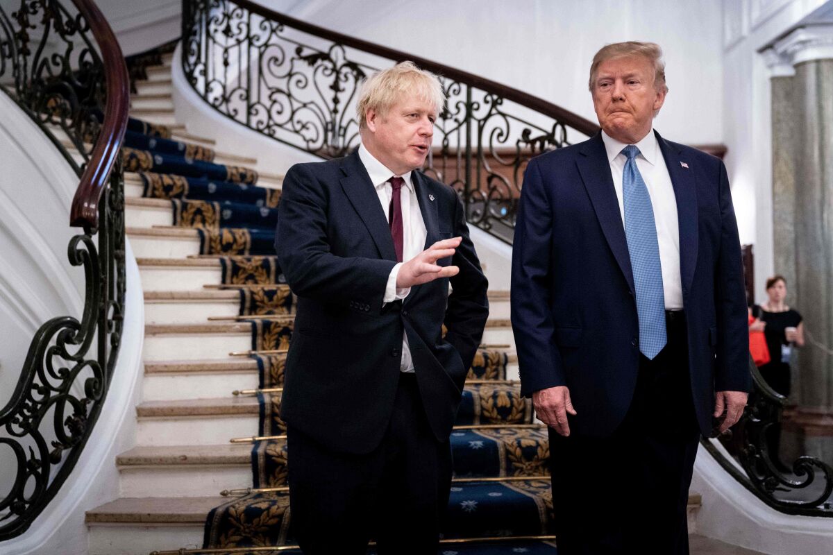 President Trump and Britain's Prime Minister Boris Johnson at the G-7 meeting in Biarritz, France