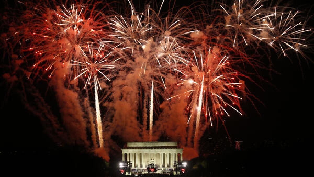 Fireworks explode over the Lincoln Memorial.