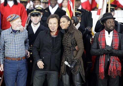 R&B star Beyonce embraces Bruce Springsteen.