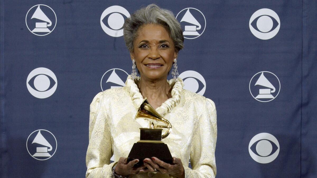 Nancy Wilson poses with her Grammy Award for best jazz vocal album for "R.S.V.P. (Rare Songs, Very Personal)" at the awards ceremony at Staples Center in 2005.