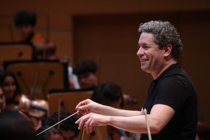 Los Angeles, CA - July 14: Conductor Gustavo Dudamel rehearses with young musicians from around the country participating in the L.A. Phil's annual YOLA National Program at Walt Disney Concert Hall on Friday, July 14, 2023 in Los Angeles, CA. (Dania Maxwell / Los Angeles Times).