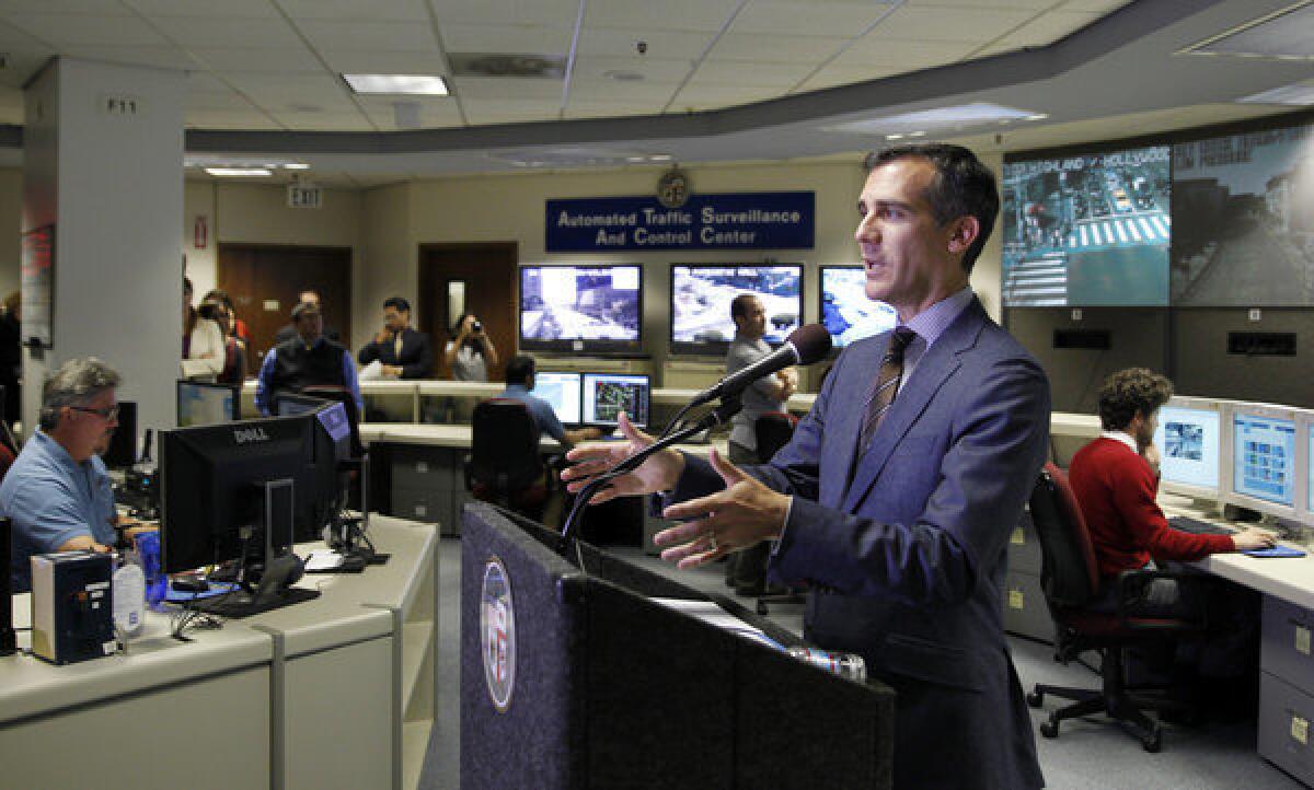 Los Angeles Mayor Eric Garcetti speaks at a news conference Tuesday to mark his 100th day in office and unveil a new city website.