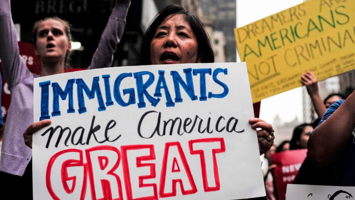 Protesters in New York City assail President Trump's decision in October to end the Deferred Action for Childhood Arrivals program. On Thursday, the administration outlined a proposal to give "Dreamers" a path to citizenship in exchange for other changes to immigration law.
