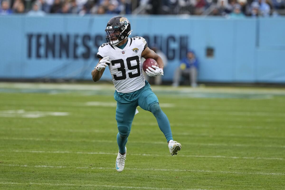 Jacksonville Jaguars wide receiver Jamal Agnew runs with the ball against the Tennessee Titans on Dec. 11.