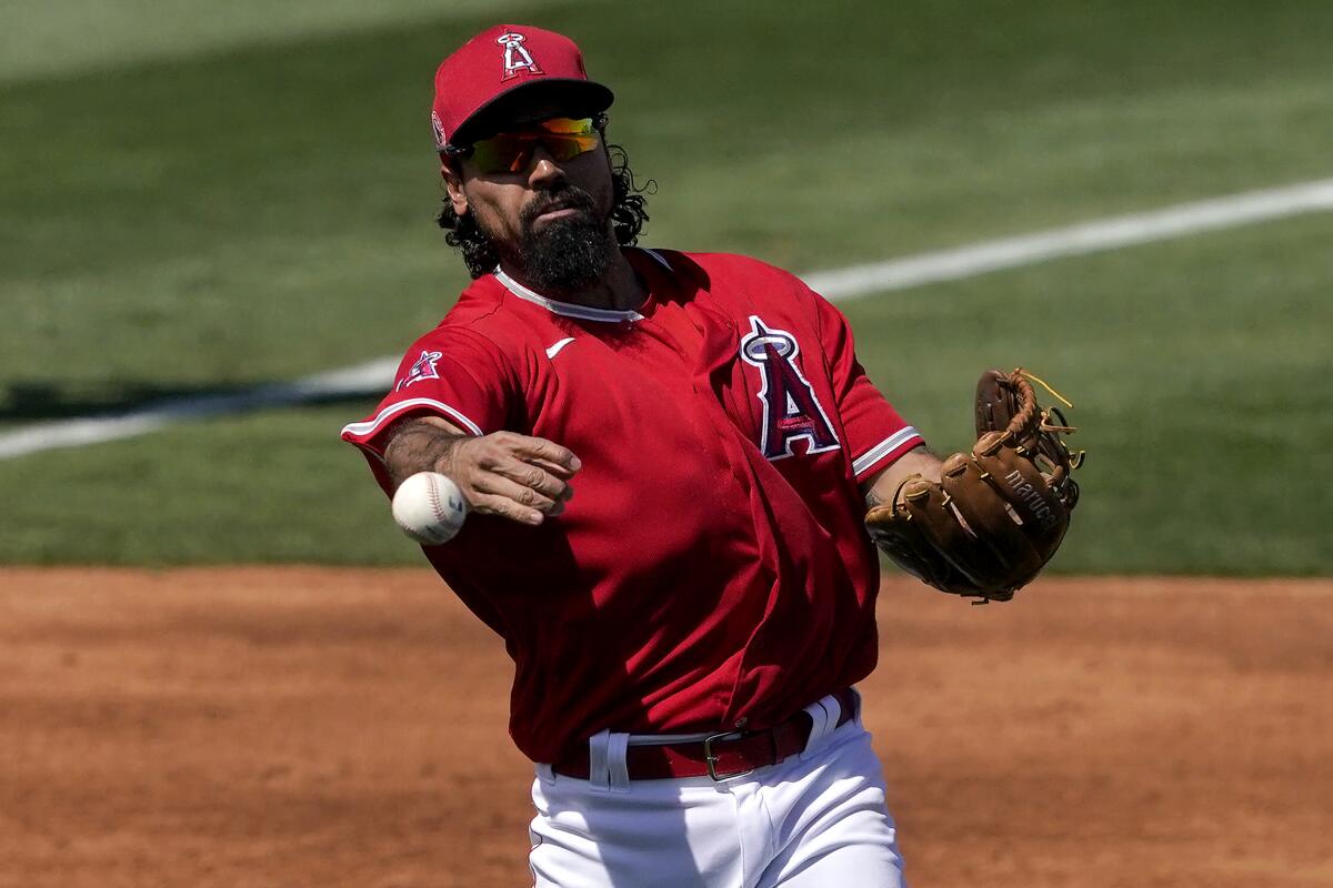 Los Angeles Angels' Anthony Rendon fields a ground out hit by Oakland Athletics' Mark Canha.