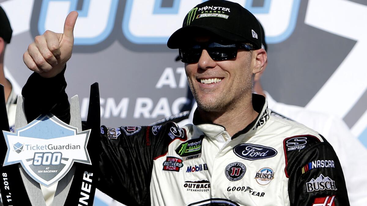 NASCAR driver Kevin Harvick is all smiles after winning the Monster Energy Cup Series race at Phoenix last weekend.
