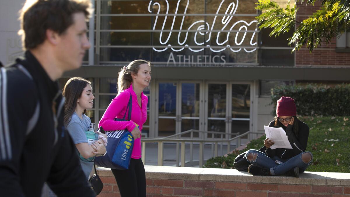 Freshman applications to University of California campuses fell for the first time in 15 years but still topped 111,000 for UCLA.
