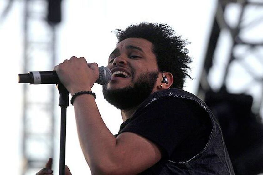 Abel Tesfaye, aka The Weeknd, performs at the Coachella Music and Arts Festival in Indio on Sunday.